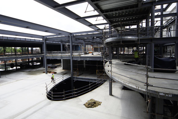 Elliptical mezzanines overlook the project’s central atrium