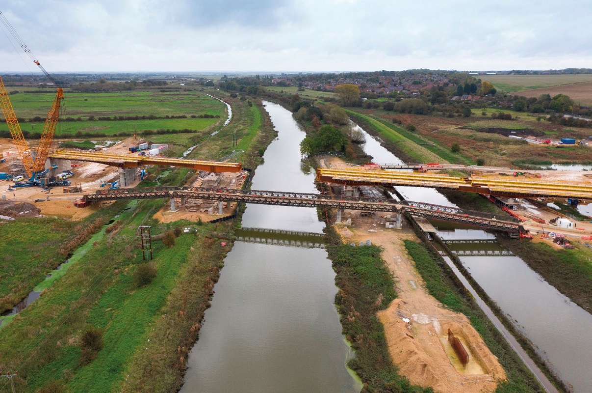 Dykes running parallel to the river meant a crane with a long reach was required