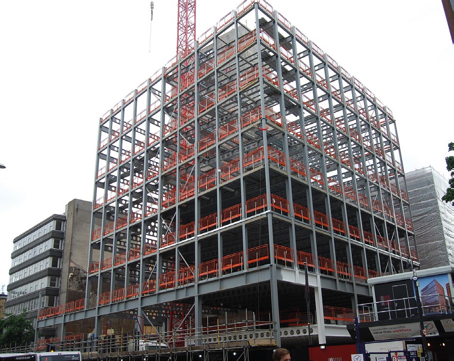 Transfer beams form a ring at second floor level to allow fewer columns on the lower levels