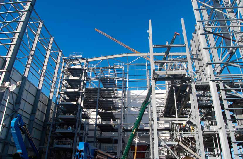 One fa&#231;ade of the boiler house is left out to allow the installation of large equipment