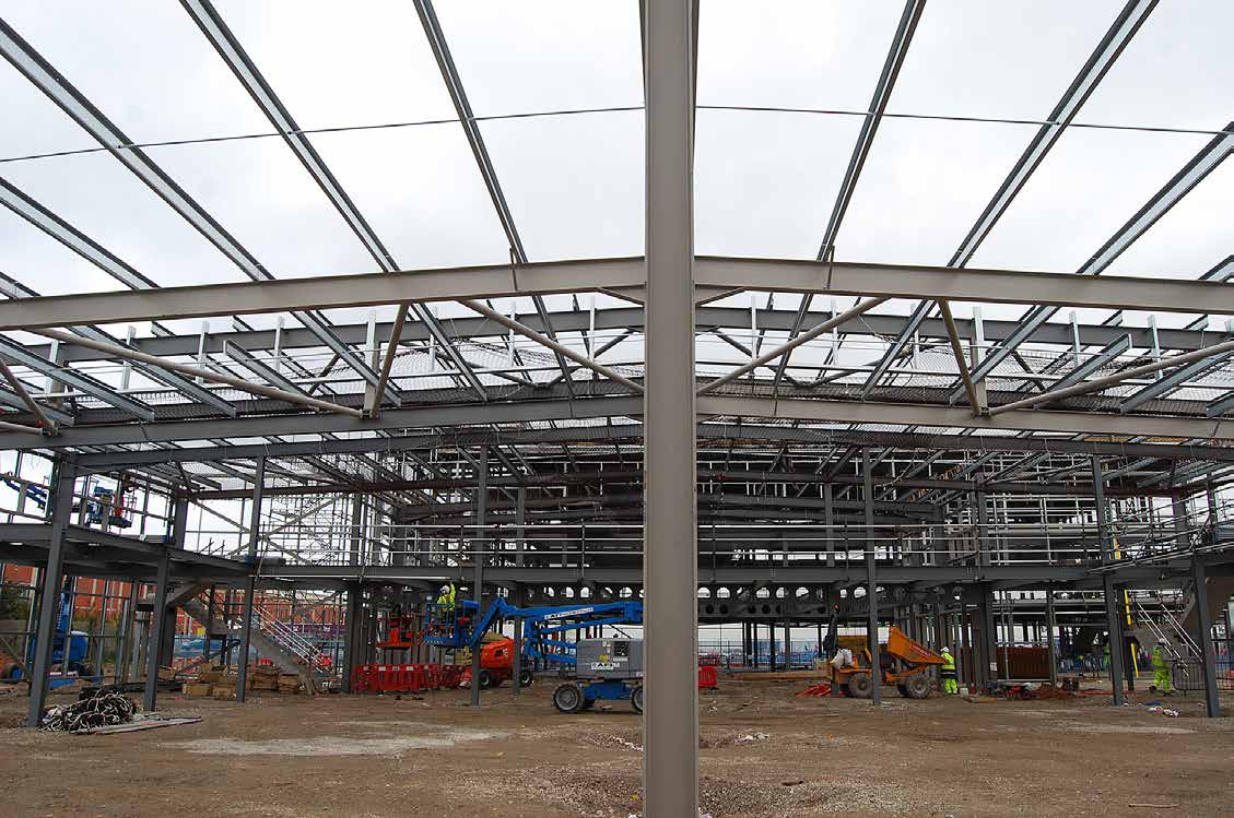 The JLR showroom is divided in two by a central row of columns
