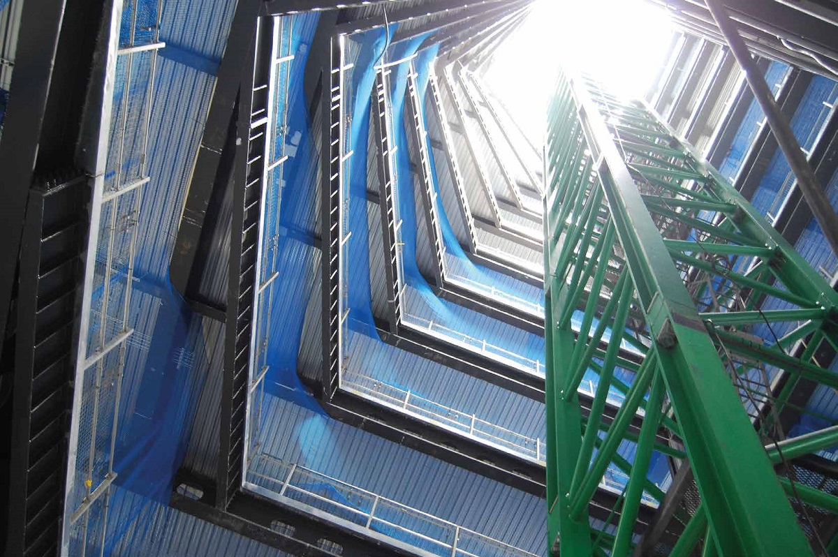 The building features a centrally positioned spiralling atrium