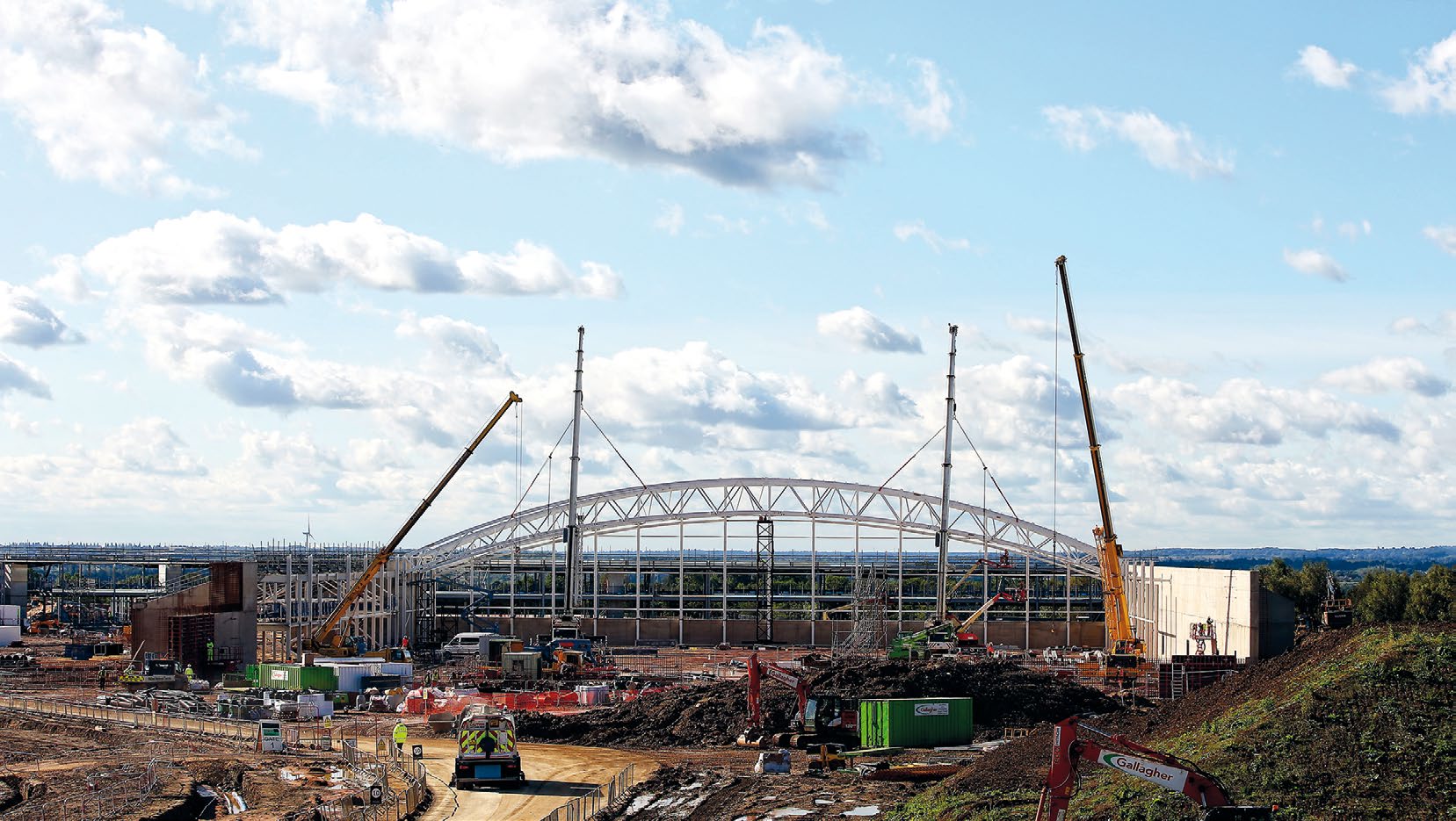 A total of 13 arched trusses form the signature structure