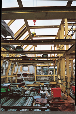 Shallow floor system behind the retained facade