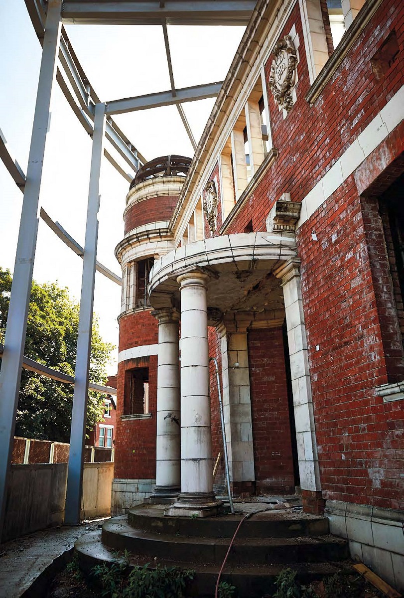 Steelwork wraps around the former school entrance