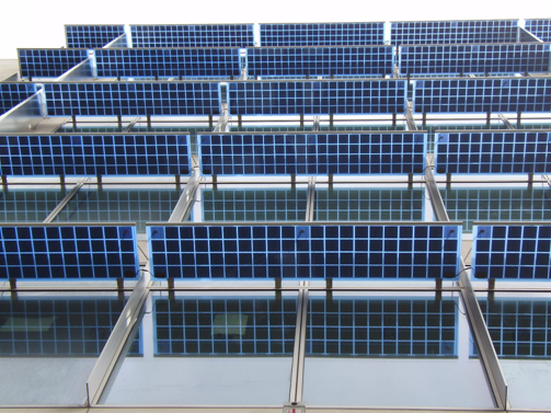 Solar shading with bonded photovoltaic cells attached to a curtain walling system