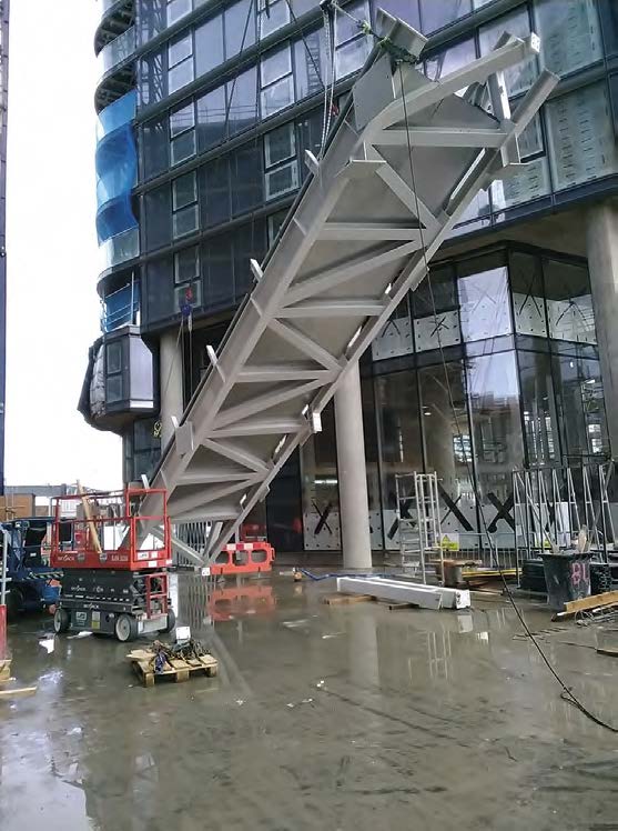 A Halo roof structure section is lifted into position