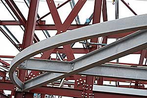 Curved members adorn the rear of each finger block