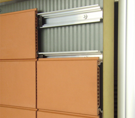 Use of composite (sandwich) panels to support tiles. (Image courtesy of Kingspan Panels and Profiles)