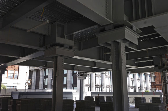 Large bearings isolate the upper levels of the building