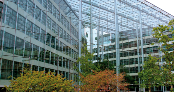 Tubular steel columns in 6 storey entrance atrium at Tower Place, London