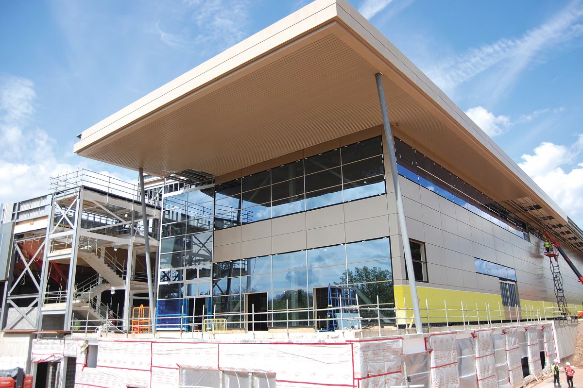 A covered terrace sits adjacent to the cafe