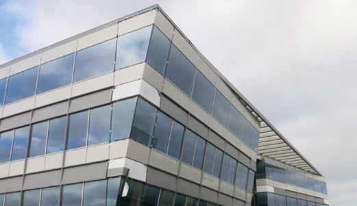 The angled façade supports a canopy over the main entrance