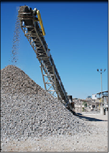 Crushing (downcycling) of concrete into aggregate