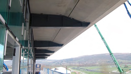 Large bespoke brackets support the balconies
