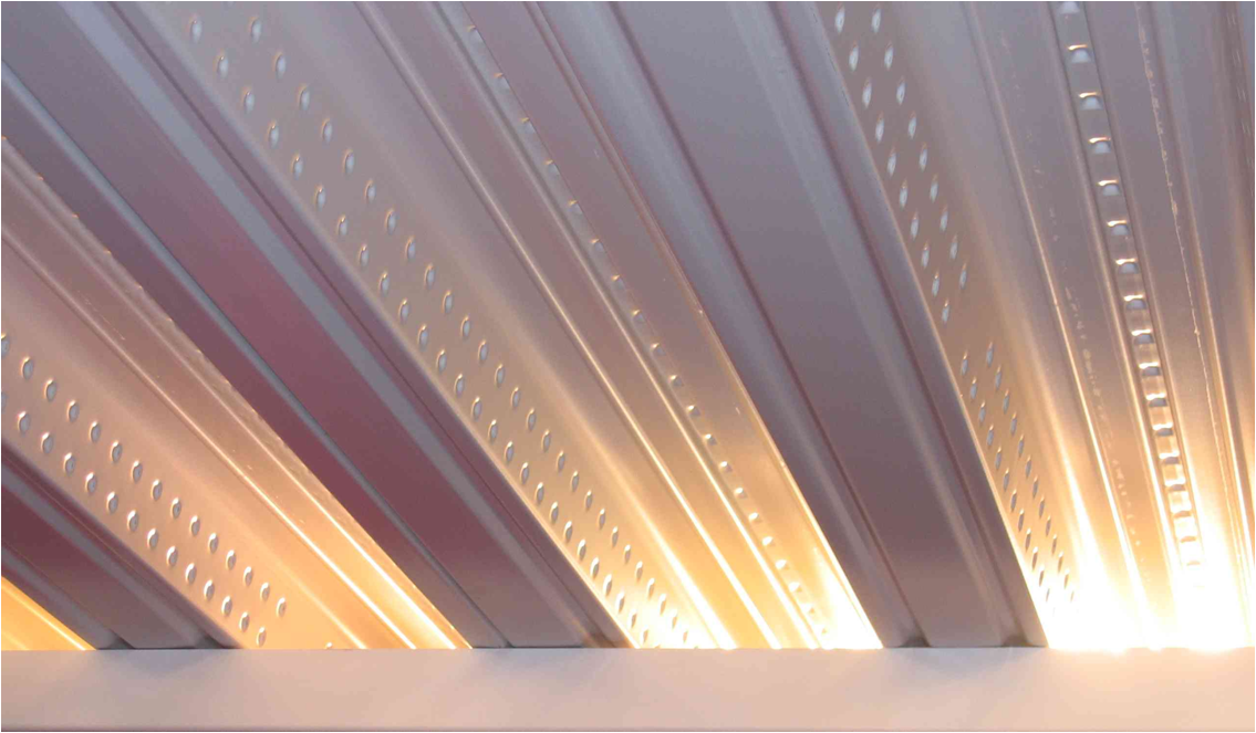 Polyester coated deck can be used to provide an attractive finish to an exposed floor. It may also have increased heat absorption compared to galvanized steel deck.
