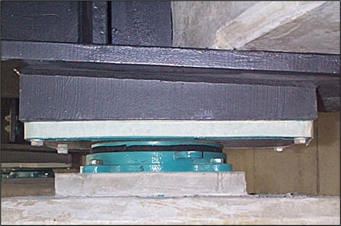 Typical elastomeric pot bearing under a steel girder