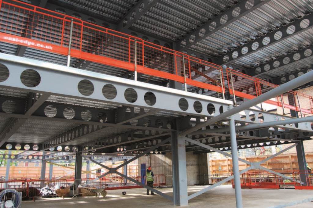 The first floor is set back to create a double-height space in the entrance foyer