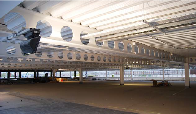 Cellular beams and decking with bright white coatings, Douglas Village, Cork&lt;Br&gt;&#39;&#39;(Image courtesy of Bourne Parking Ltd.)&#39;&#39;