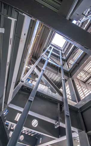 A steel braced core is positioned above the existing raft