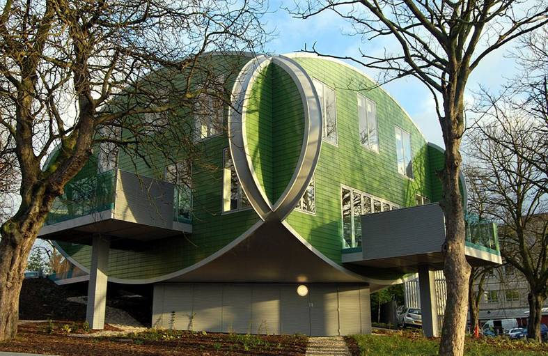 The structure gives the impression of floating on a pedestal