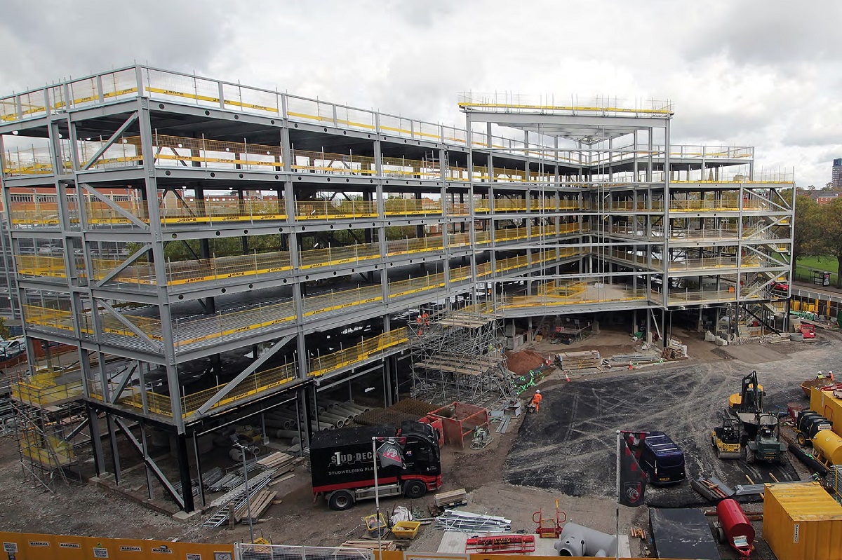 The steel frame forms a V-shaped structure, with the widest part facing the stadium