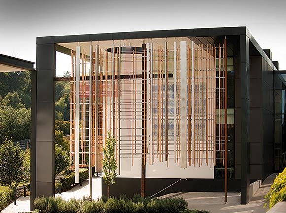 The twelve apostles are represented by hanging steel boxes