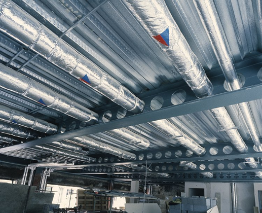 Long span cellular beams with regular circular openings