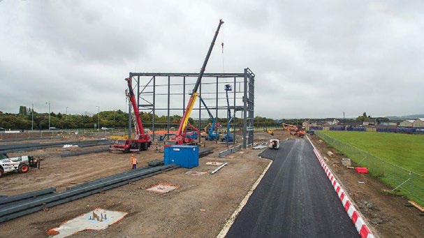 EvadX erecting the initial bay of steelwork