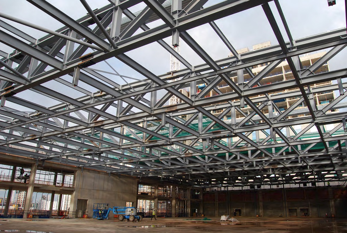 A series of steel trusses form the large open ballroom
