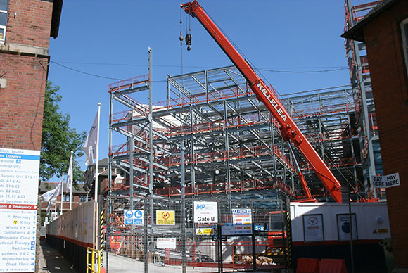 The site is extremely confined and surrounded by functioning hospital buildings