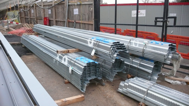 Bundles of deep decking that are cut to length, marked and lifted into place