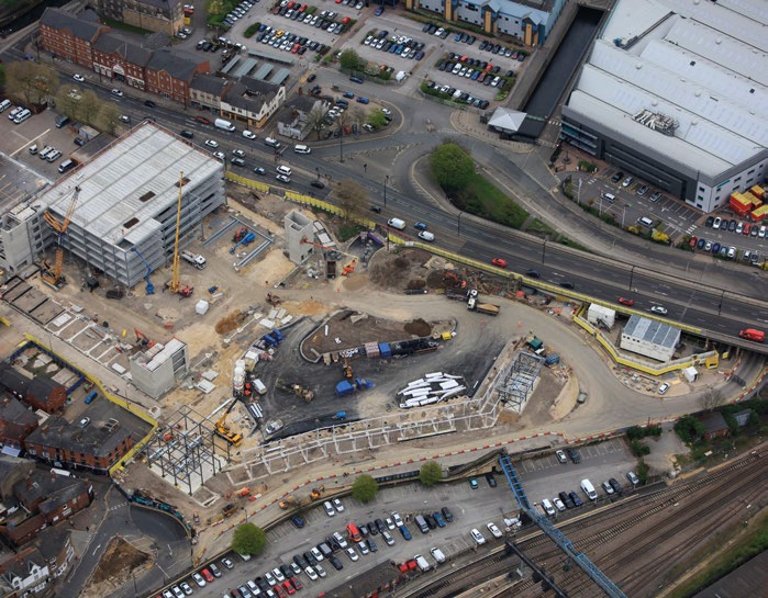 Car park and bus station (bottom of picture) simultaneously under construction