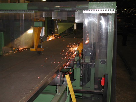 Automated edge grinding machine (Image courtesy of Mabey Bridge Ltd.)