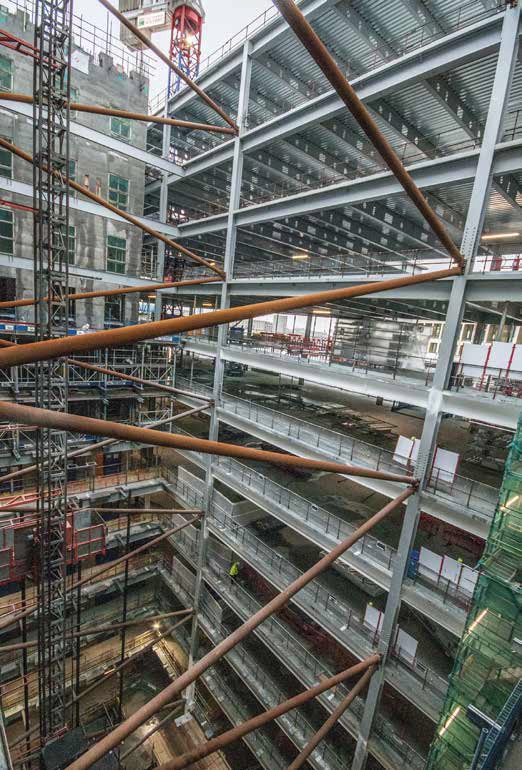 Temporary steel supports the atrium until the floors are cast