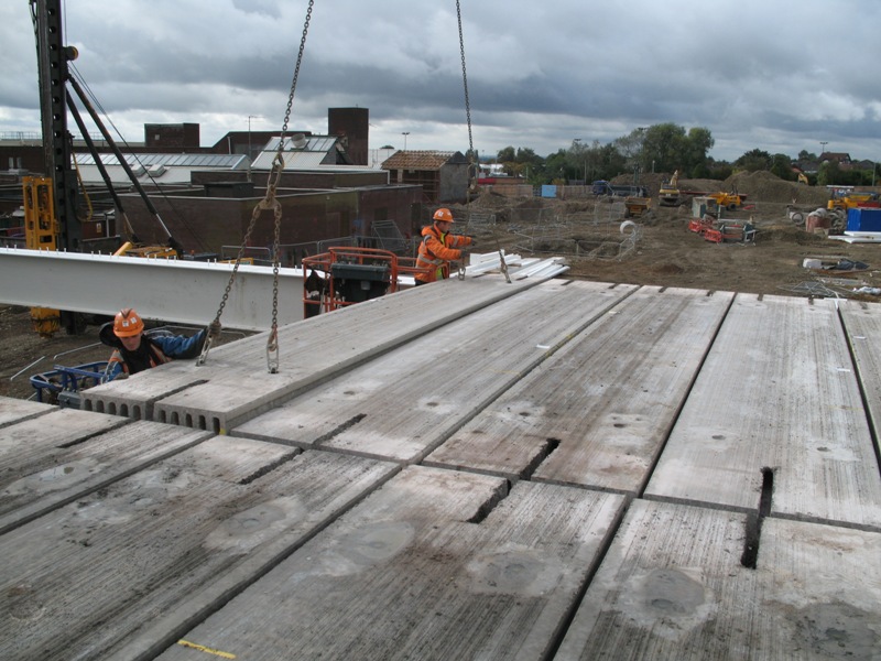 Erecting precast floor planks Image courtesy of Severfield (Design & Build) Ltd.