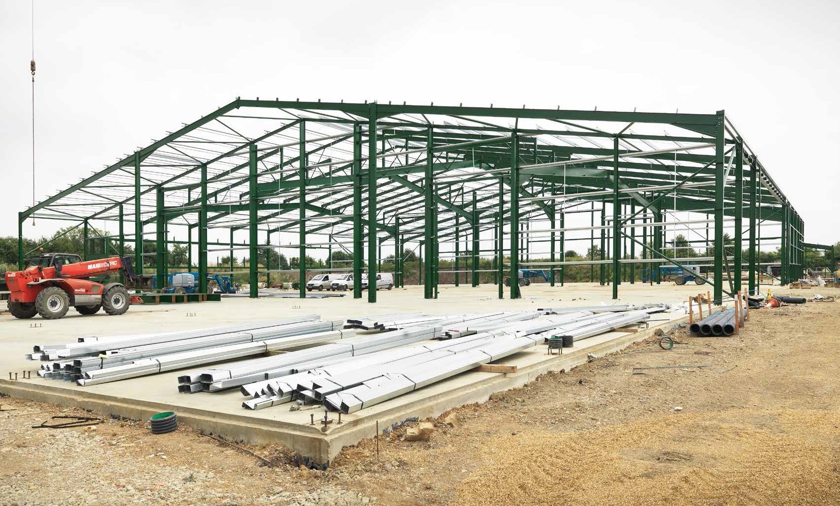 Steel goes up on the previously completed slab