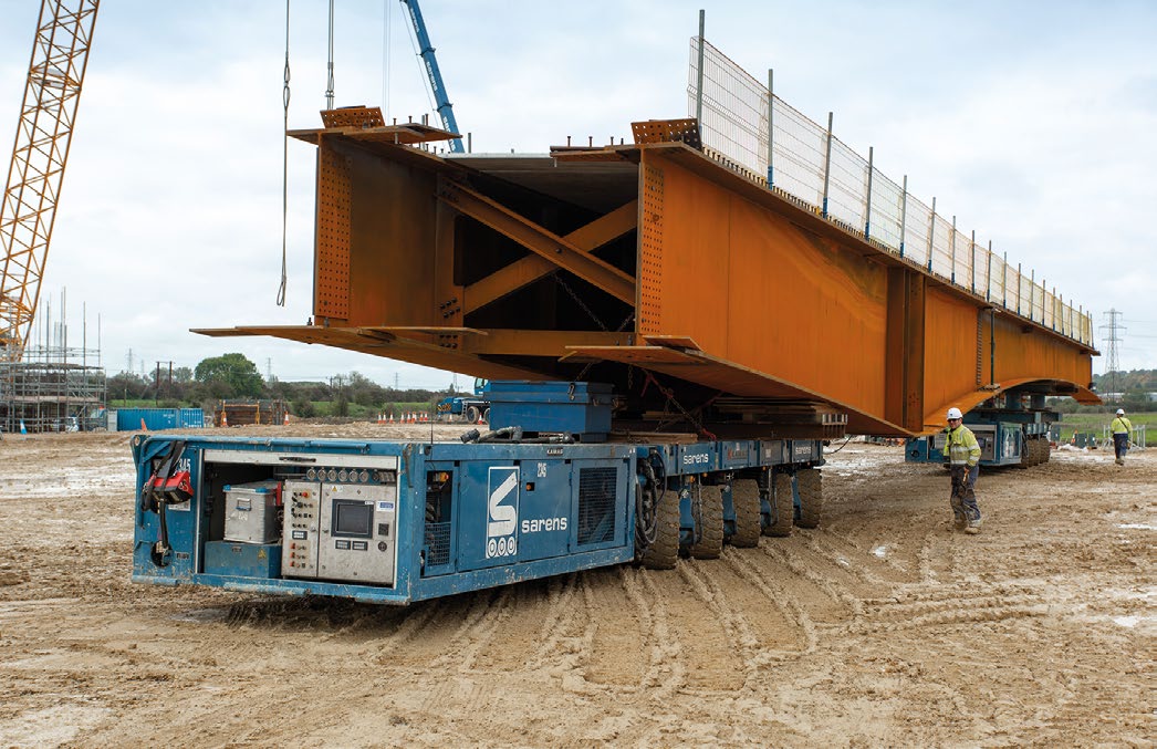 In order to be installed, bridge girders were tranported to the crane by SPMTs
