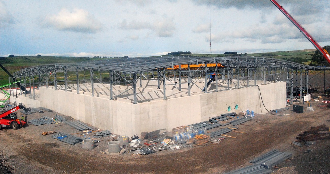 The largest building has a standout dual-curving roof