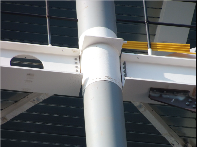 An exposed, reinforced concrete filled hollow section