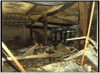 The aftermath of the fire at Broadgate Phase 8 in London. The building was only partially protected and, based on the performance of individual element tests, should have collapsed. However, it did not do so and exhibited considerable robustness. The damage shown here was repaired and the structure reinstated.