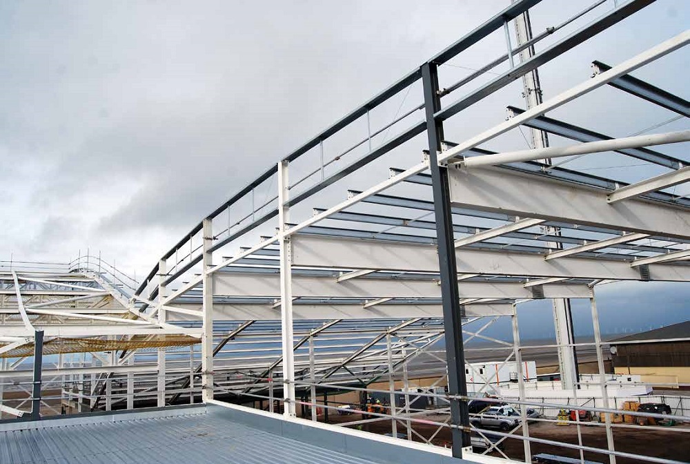 The scheme features two structures topped with wave-like roofs