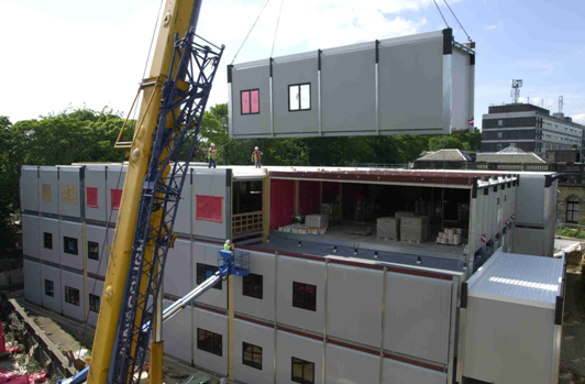 Modular hospital building during installation of open sided modules (Image courtesy of Portakabin)