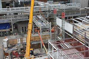 Erecting steel in a confined site surrounded by an operating brewery has been a challenge