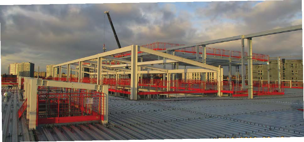 The full-height atrium is topped by a steel-framed enclosure accommodating rooflights
