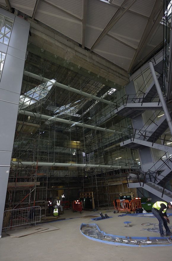Steel footbridges span the cavernous interior