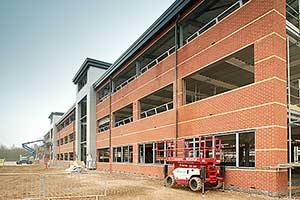 The three level office block is divided by two core areas