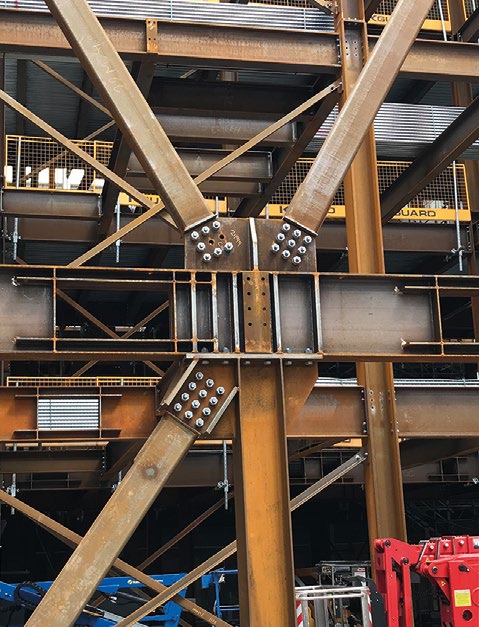 The steel frame's stability-giving cross bracing is primarily located along the elevations