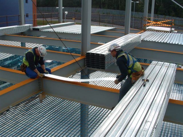 Installing re-entrant steel decking