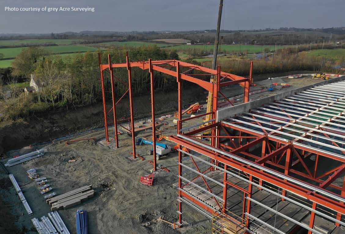 Two portal frames sit either end of the building